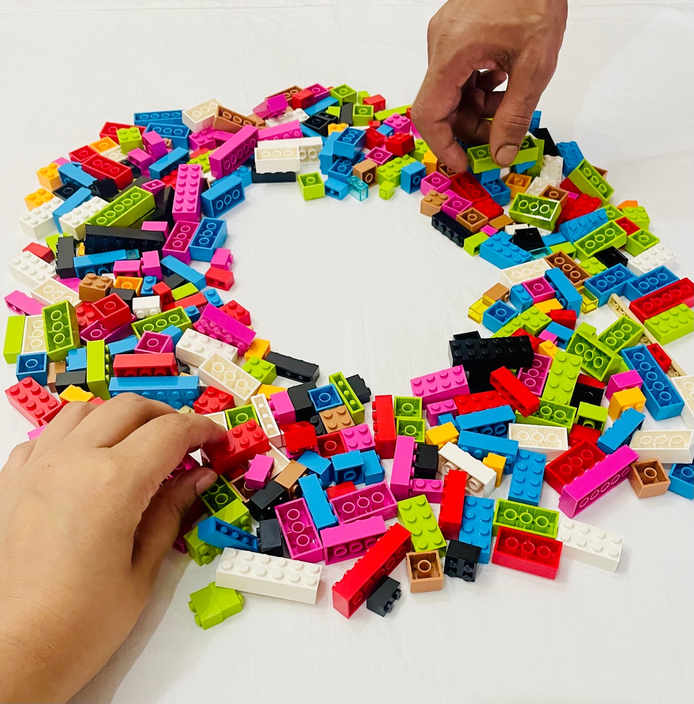 Participants building a LEGO® SERIOUS PLAY® model together